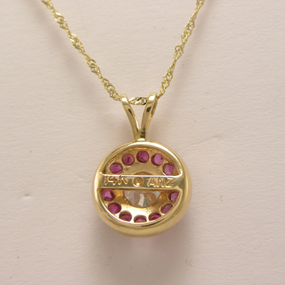 14k Gold Ruby & white Topaz Pendant neckless