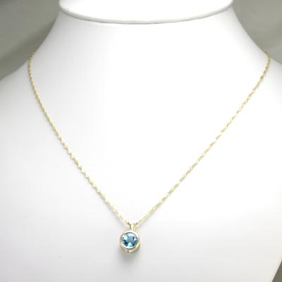 14k Gold blue Topaz Solitaire Pendant