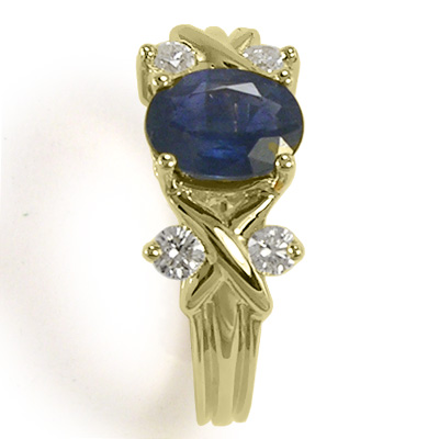 Sapphire and Diamond X ring in 18k solid gold